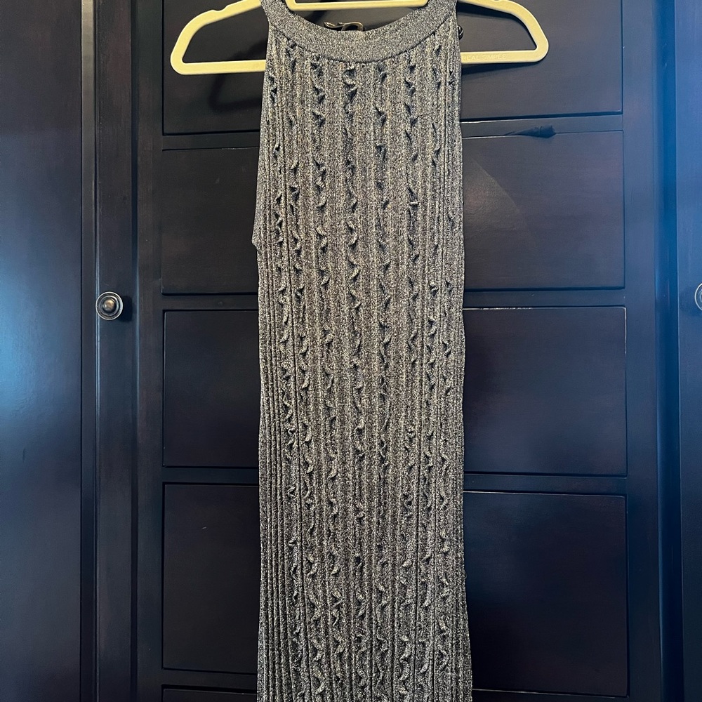 Cocktail dress. Metallic stretch knit.Very flattering